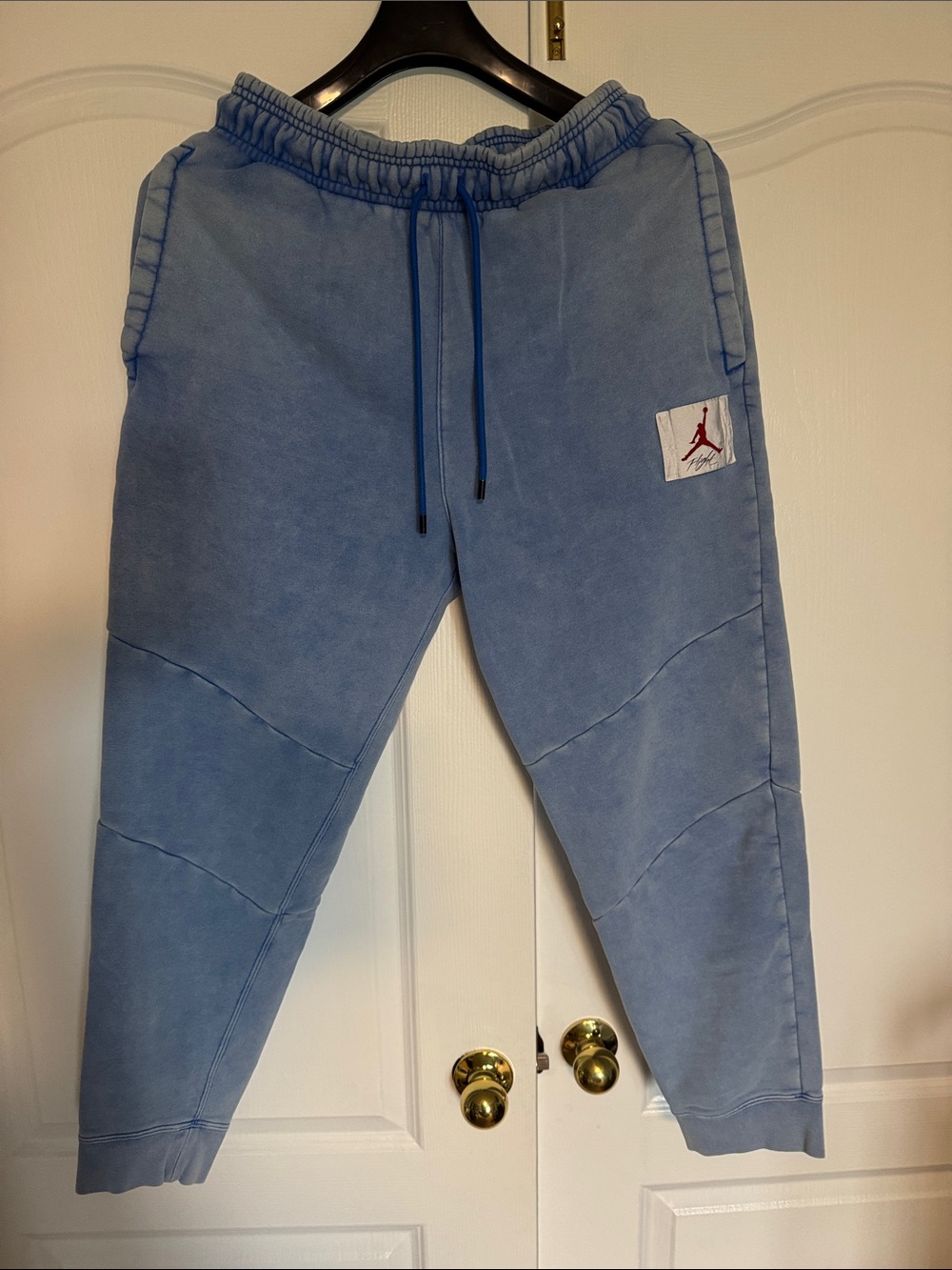Jordan Men's Washed Light Blue Fleece Joggers with Red Jumpman Patch large